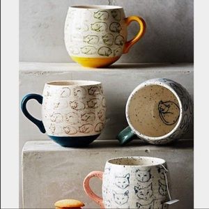 ISO cat mugs, yellow or blue